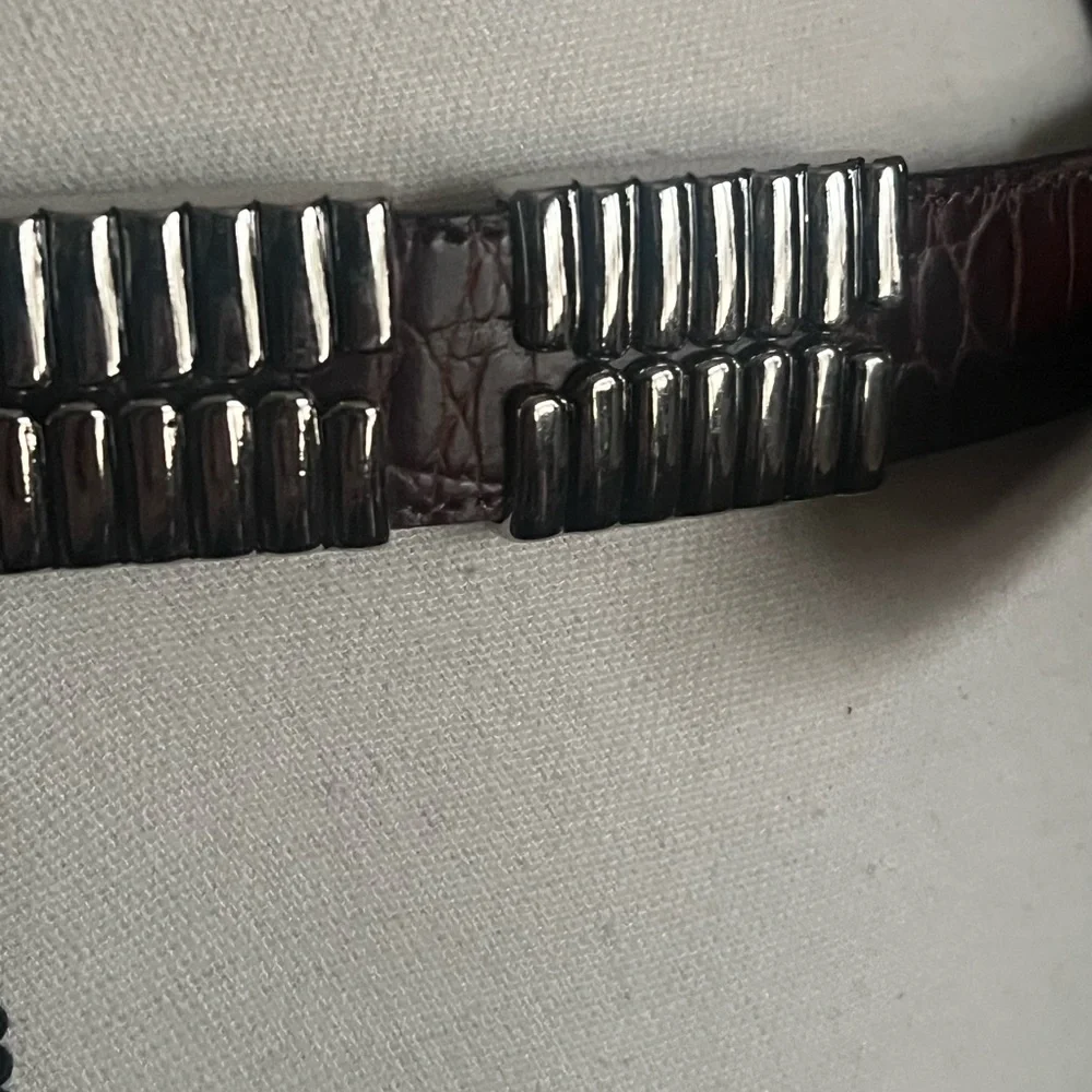 Leather Croc embossed Belt with Silver tone embellishments all around. SZ. M